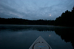 Kayak fishing before sunrise on Ash Lake