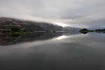 Kayak fishing on the Columbia River on a rainy late summer day