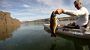 Kayak fishing for smallmouth bass on the Columbia River near Rowena, Oregon