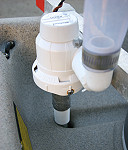 Install bait pump into the scupper