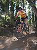 Don rolling over rocky singletrack
