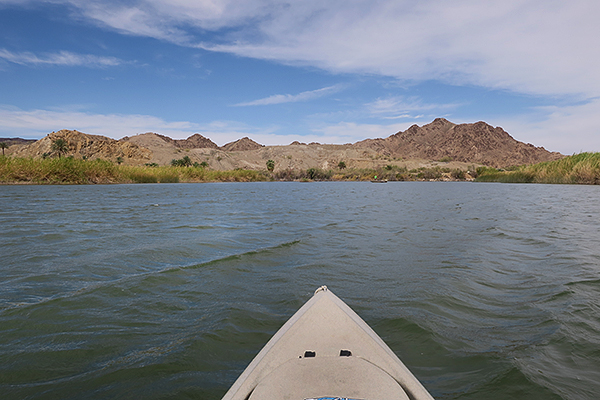 Kayak fishing for largemouth bass on a windy Colorado River