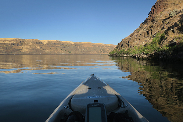 Hot summer morning kayak fishing on the Columbia River in Eastern WA