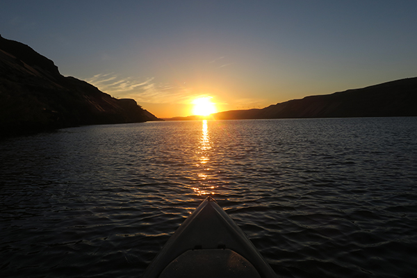 Sunrise on the Columbia River in eastern WA kayak fishing for smallmouth bass