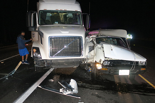 Rear ended by 40 ton semi doing 50mph while stopped for flagman in road construction zone