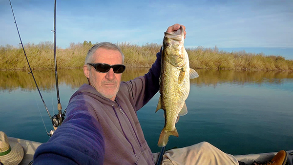 Screen grab from the latest watermanatwork.com kayak fishing video; Huge Bass Redemption