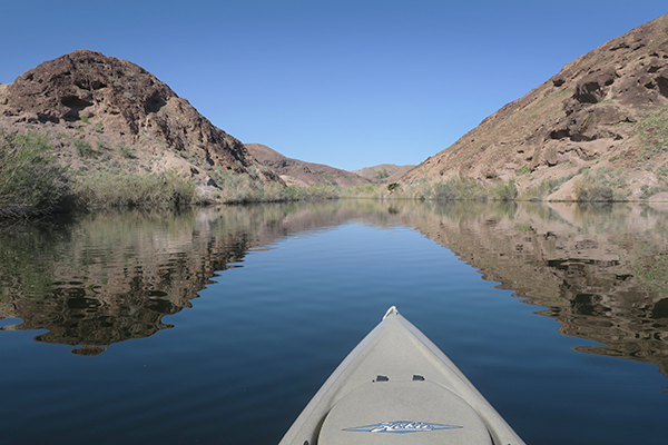 Kayak fishing for largemouth bass on the Colorado River with watermanatwork.com