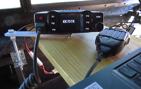 Simple and inexpensive radio mount for a pickup truck with bed rails